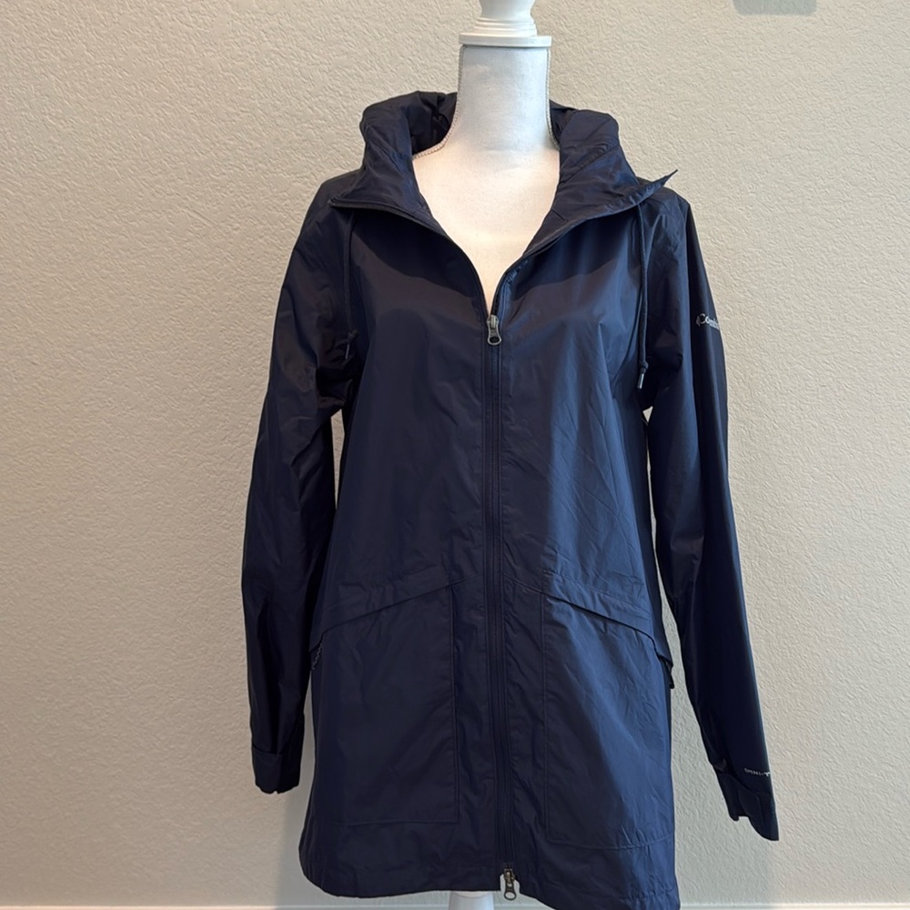 Brand new never worn Columbia navy light weight raincoat. Size large.
